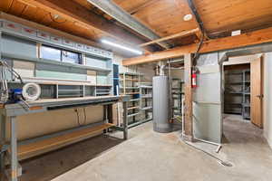 Basement featuring gas water heater