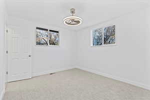 View of carpeted spare room