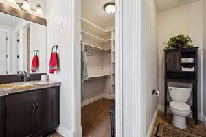 Bathroom with vanity and toilet