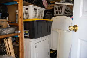 Clothes washing area featuring washer / clothes dryer