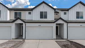 View of front of property with a garage