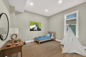 Bedroom featuring hardwood / wood-style flooring