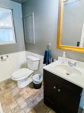 Bathroom featuring toilet and vanity