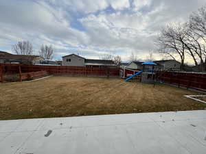 View of yard with a playground