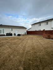 View of yard with a patio area and french doors