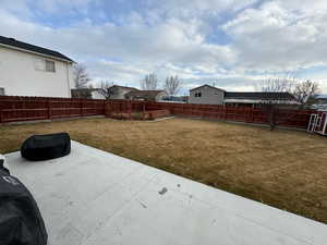 View of yard with a patio