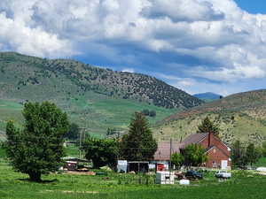 Property view of mountains featuring a rural view