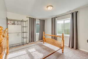 Unfurnished bedroom featuring carpet floors