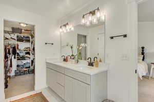 Bathroom featuring vanity and tile patterned floors