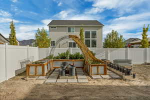 Back of house with a mountain view