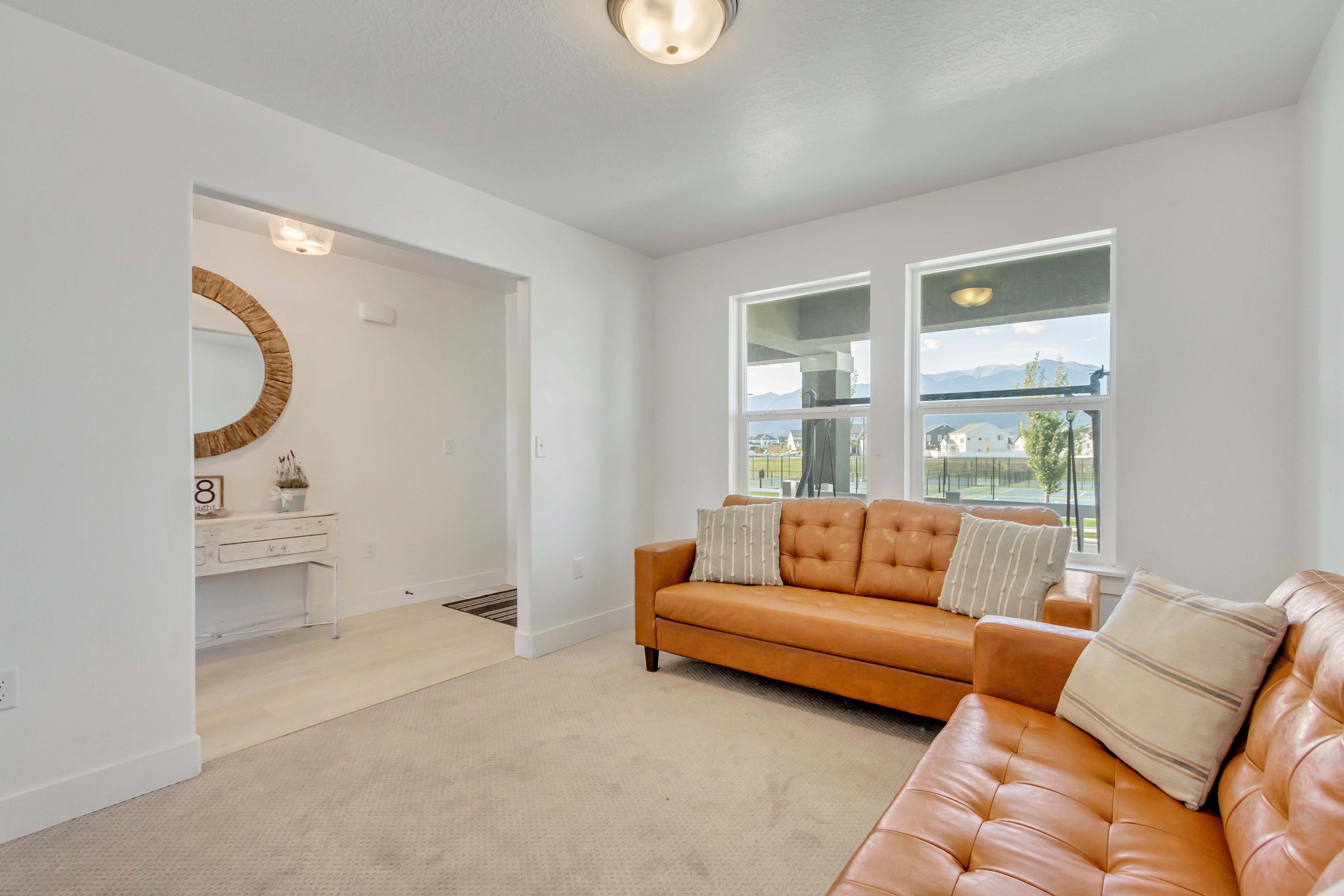 Living room with light colored carpet