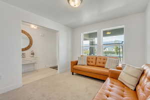 Living room with light colored carpet