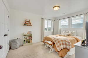 View of carpeted bedroom