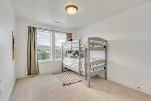 View of carpeted bedroom