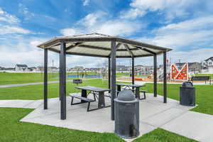 View of community with a yard and a gazebo