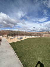 View of yard with a rural view