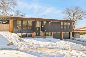 View of front of property featuring a garage