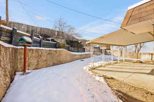 View of yard covered in snow