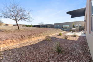 View of yard with a patio area