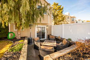 View of patio featuring an outdoor hangout area