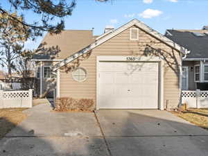 View of front of property with a garage