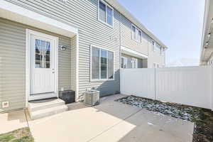 Exterior space with a patio area and central air condition unit