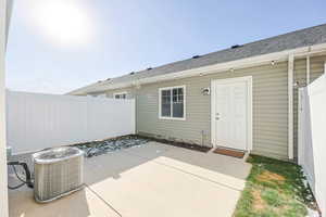 View of patio leading to garage enterance