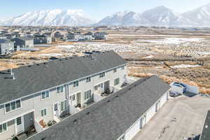 Snowy aerial view with a mountain view