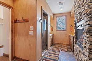 Bathroom with vanity and a shower