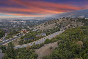 Aerial view at dusk featuring a mountain view