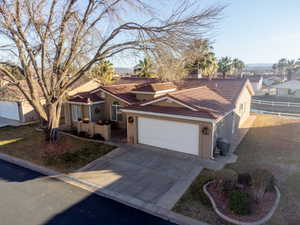 View of front of property with a garage