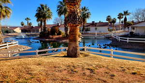 Dock area featuring a water view