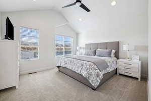 Carpeted bedroom with lofted ceiling, recessed lighting, visible vents, a ceiling fan, and baseboards
