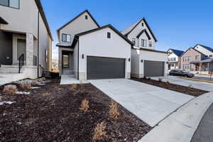Modern farmhouse style home with driveway and central AC unit