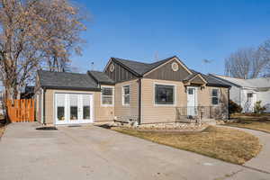 View of front of property with large driveway