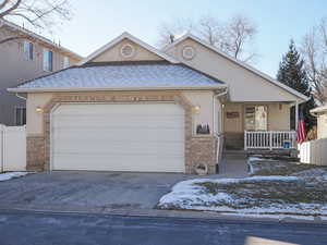 Covered porch and 2 car garage