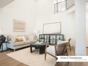 Living room with wood-type flooring