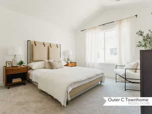 Bedroom featuring light colored carpet and vaulted ceiling