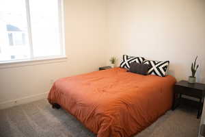 View of carpeted bedroom