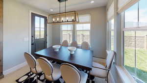 Dining area with a chandelier