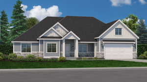 Craftsman-style home with a garage and a front lawn