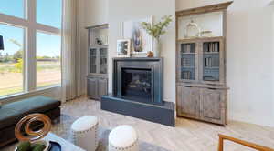 Living room with light parquet flooring