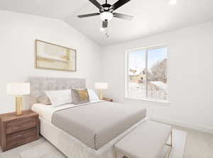 Carpeted bedroom with vaulted ceiling and ceiling fan