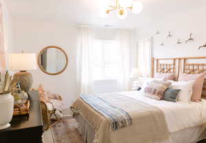 Bedroom with a chandelier