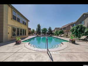 View of swimming pool featuring a patio