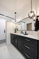 Bathroom with vanity and walk in shower