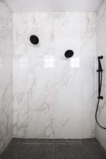 Bathroom with tiled shower