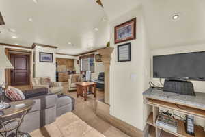 Living room featuring ornamental molding