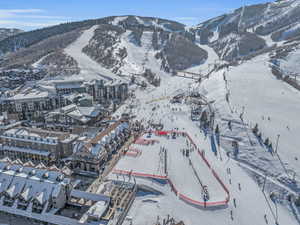 Snowy aerial view with a mountain view