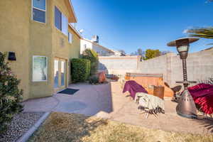 View of yard featuring a patio and a hot tub